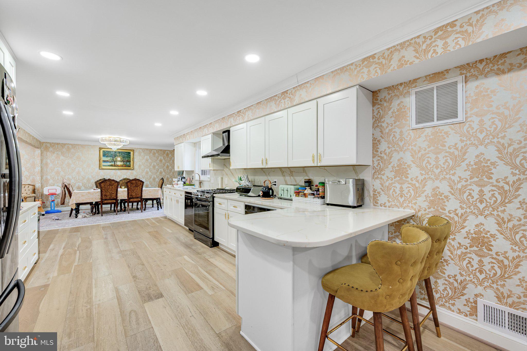 10904 Gainsborough Road Potomac, MD 20854 - Photo 19 of 32 Elegant kitchen with stylish decor.