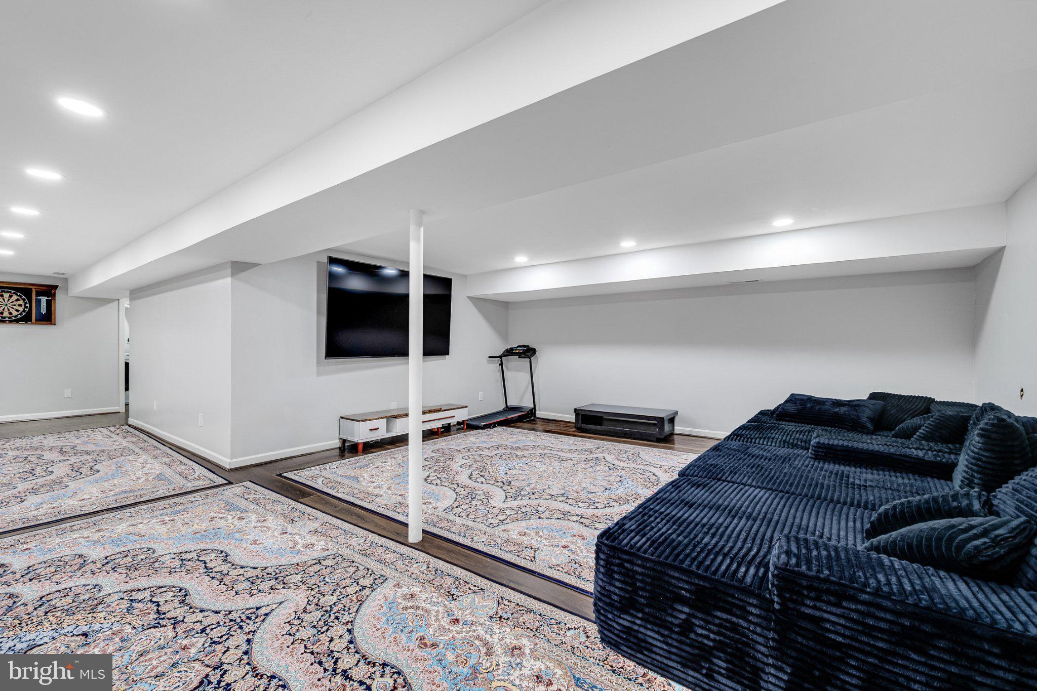 10904 Gainsborough Road Potomac, MD 20854 - Photo 28 of 32 Spacious, modern basement retreat.