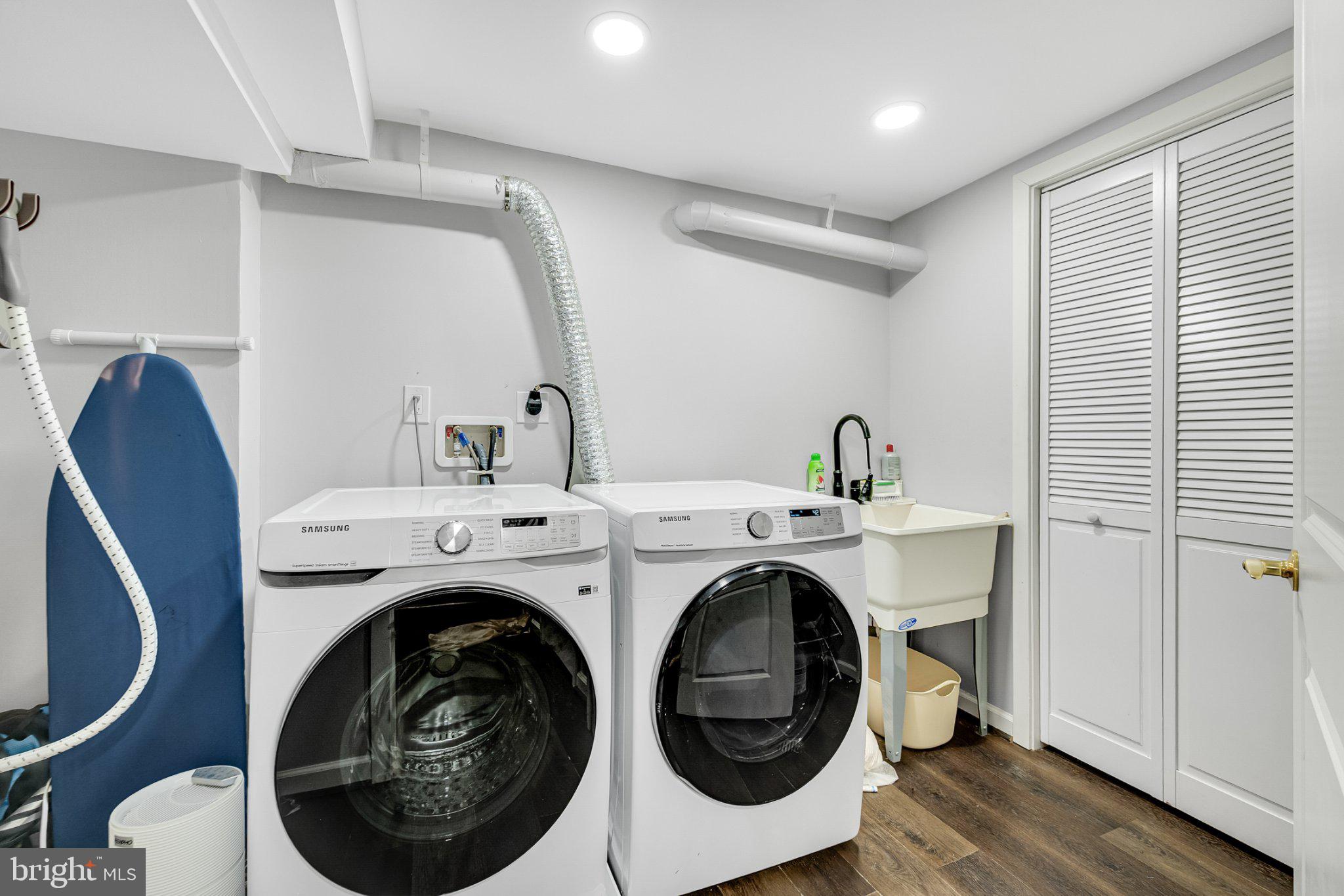 10904 Gainsborough Road Potomac, MD 20854 - Photo 31 of 32 Modern laundry space with sleek appliances.