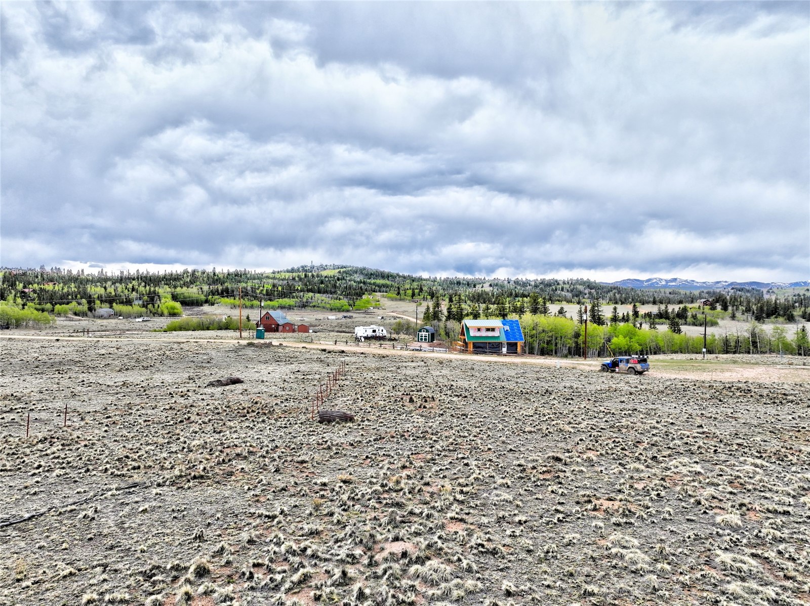 71 Mallard Road Como, CO 80432 - Photo 6 of 16 a view of a road with a building in the background