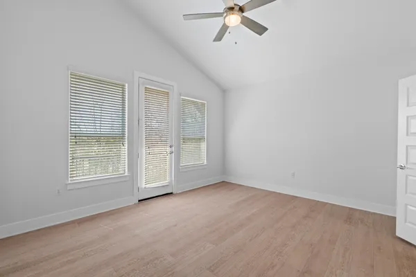 an empty room with windows