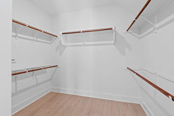 a view of an empty walk in closet