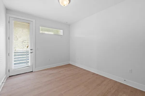 an empty room with windows