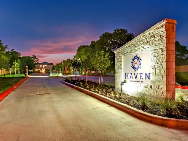 a view of swimming pool with a yard and sitting area
