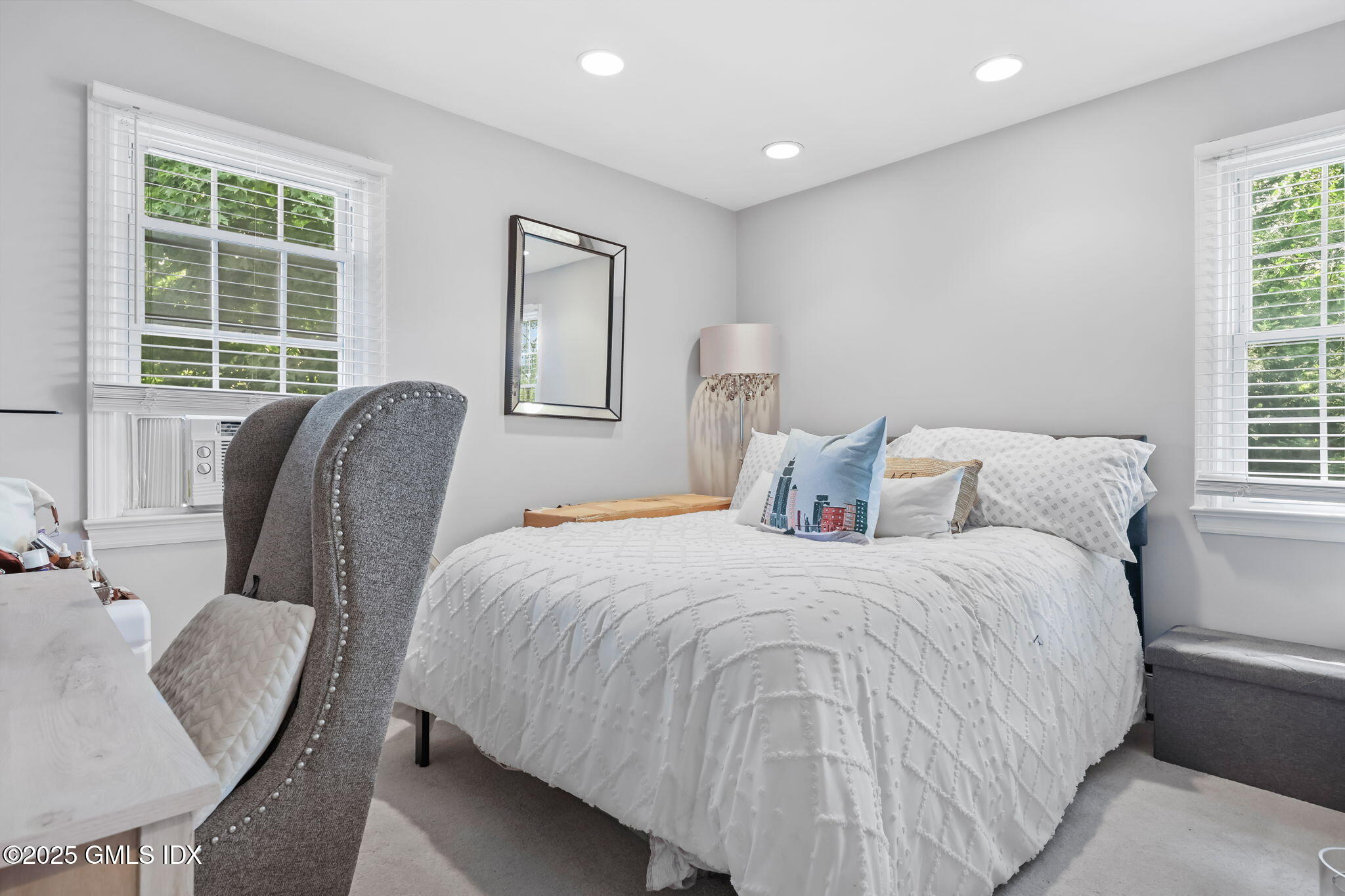 47 Valley Road, Unit B3 Cos Cob, CT 06807 - Photo 14 of 18 a bedroom with a bed chairs and window