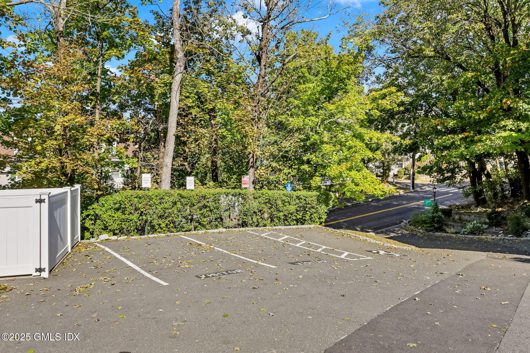47 Valley Road, Unit B3 Cos Cob, CT 06807 - Photo 16 of 18 a view of a street with a tree