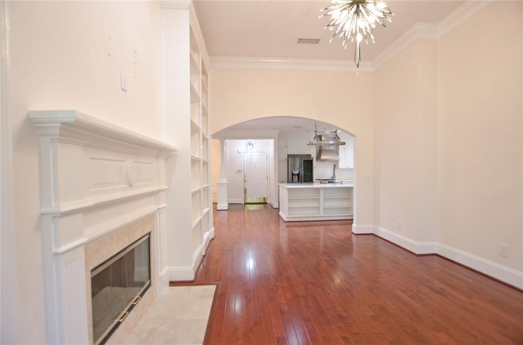 4100 Paces Walk Southeast, Unit 1305 Atlanta, GA 30339 - Photo 11 of 45 a view of livingroom with furniture and fireplace