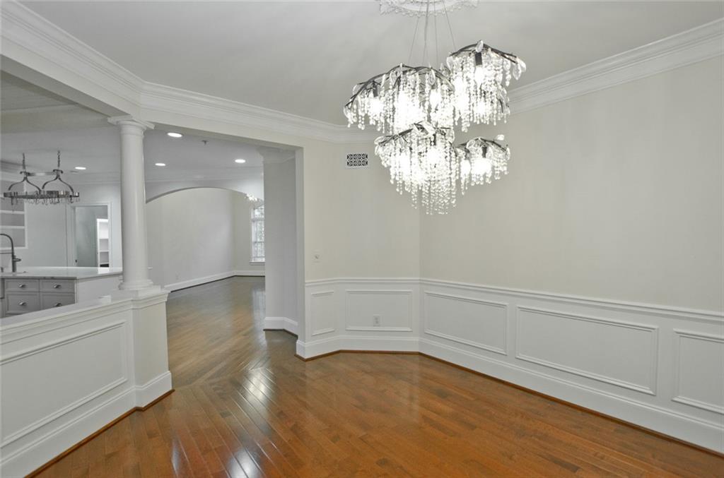 4100 Paces Walk Southeast, Unit 1305 Atlanta, GA 30339 - Photo 15 of 45 a view of a chandelier in a room