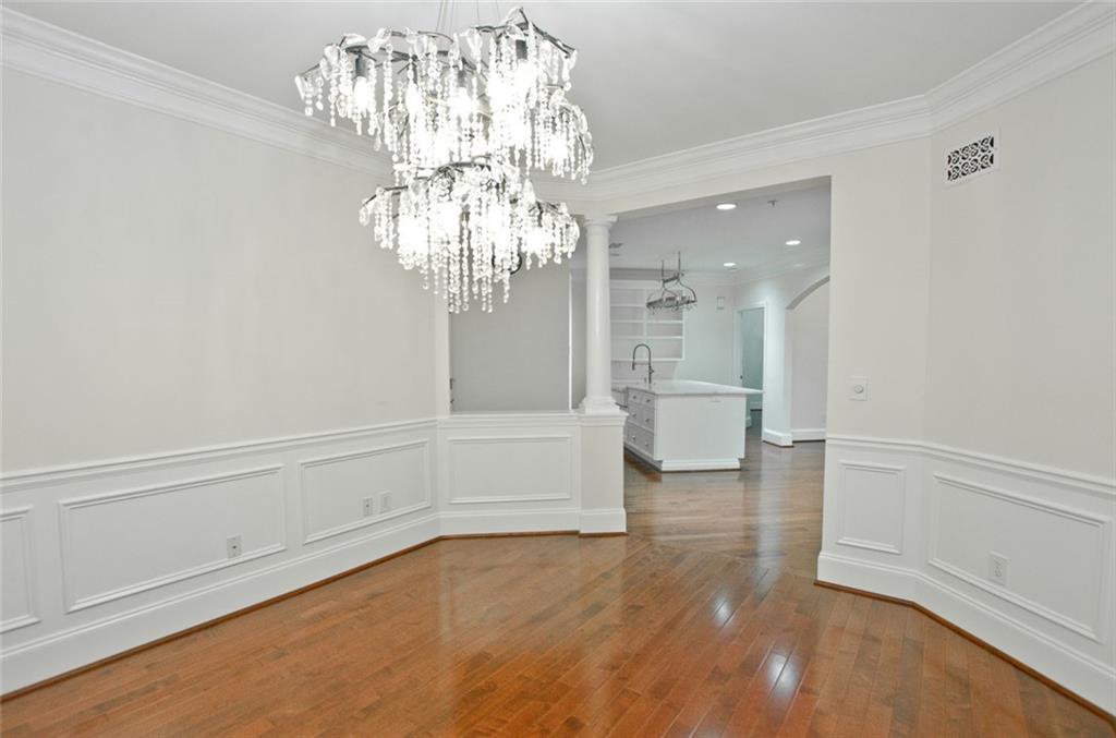4100 Paces Walk Southeast, Unit 1305 Atlanta, GA 30339 - Photo 16 of 45 a view of a chandelier in a room