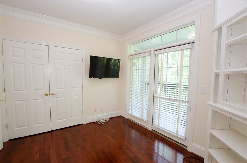4100 Paces Walk Southeast, Unit 1305 Atlanta, GA 30339 - Photo 34 of 45 a view of a livingroom with an empty space and a window