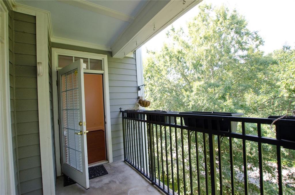 4100 Paces Walk Southeast, Unit 1305 Atlanta, GA 30339 - Photo 44 of 45 a view of a porch