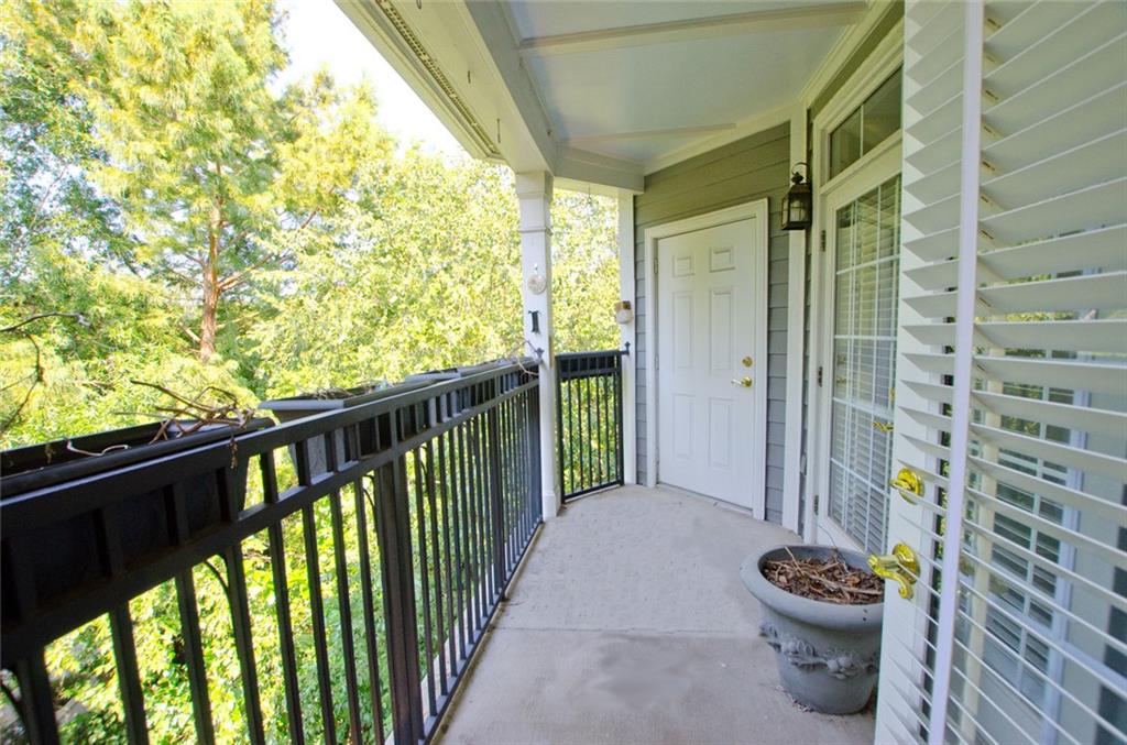 4100 Paces Walk Southeast, Unit 1305 Atlanta, GA 30339 - Photo 45 of 45 a view of a path from a balcony