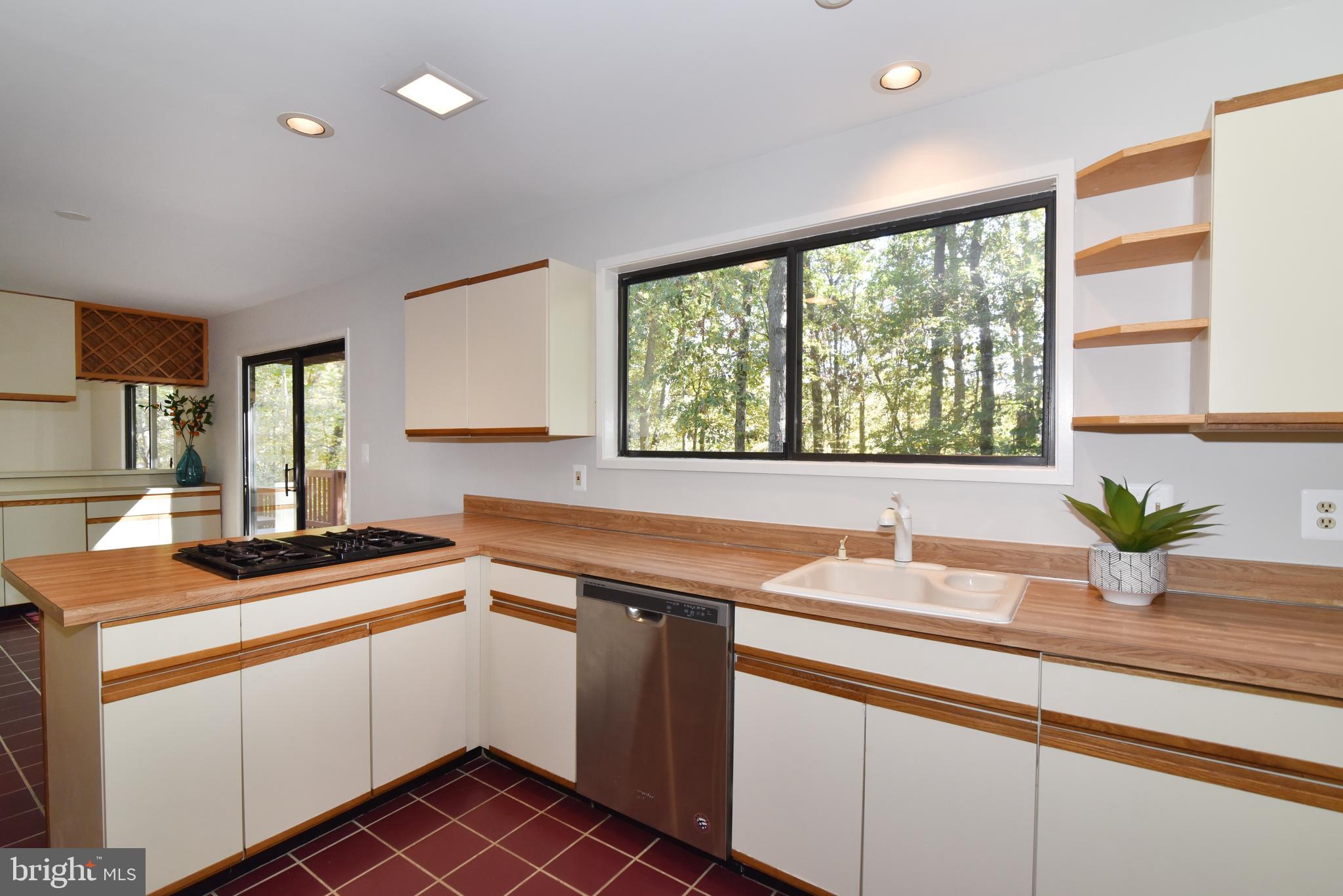 11117 Glade Drive Reston, VA 20191 - Photo 31 of 75 The large window provides views of the trees.