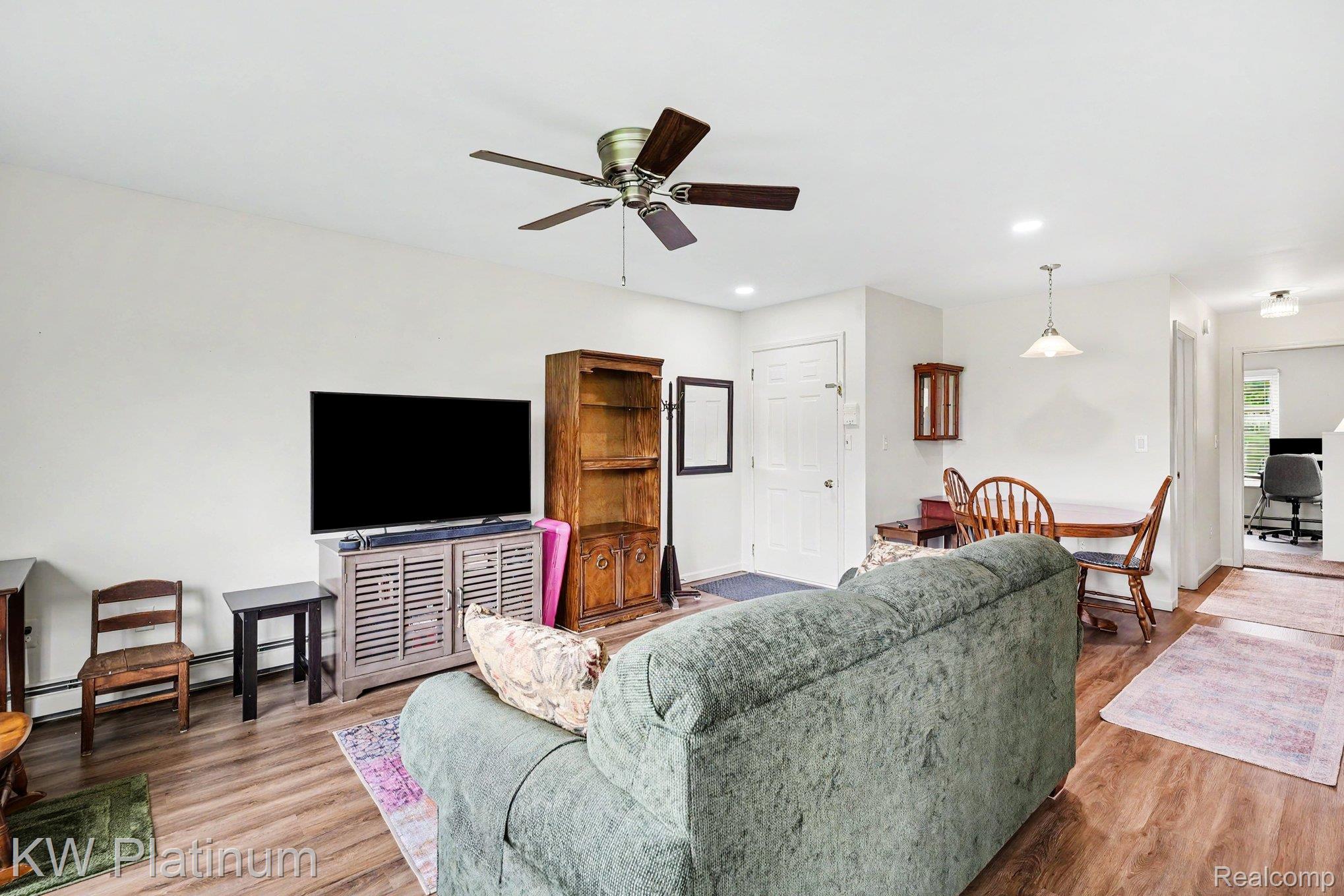 1700 River Road, Unit 6 Marysville, MI 48040 - Photo 5 of 32 Open-concept living space featuring wood-finish flooring, recessed lighting, and a ceiling fan