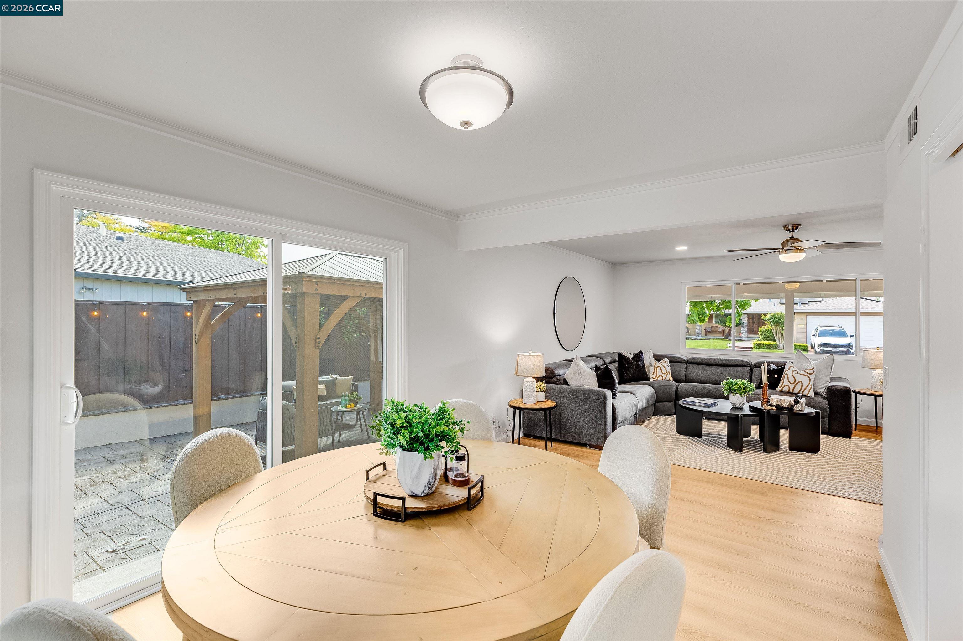 418 Devon Court San Ramon, CA 94583 - Photo 11 of 62 a living room with furniture potted plant and a large window