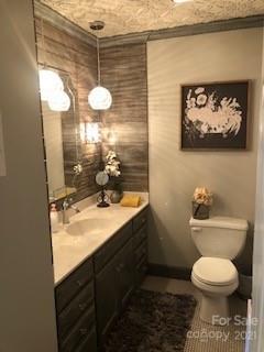 2270 Miller Road Salisbury, NC 28147 - Photo 12 of 33 a bathroom with a toilet sink and mirror