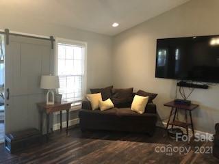 2270 Miller Road Salisbury, NC 28147 - Photo 6 of 33 a living room with furniture and a flat screen tv