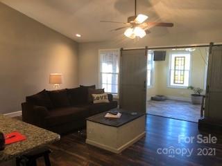 2270 Miller Road Salisbury, NC 28147 - Photo 7 of 33 a living room with furniture and a wooden floor