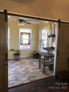 2270 Miller Road Salisbury, NC 28147 - Photo 9 of 33 a view of a bedroom with a window and wooden floor