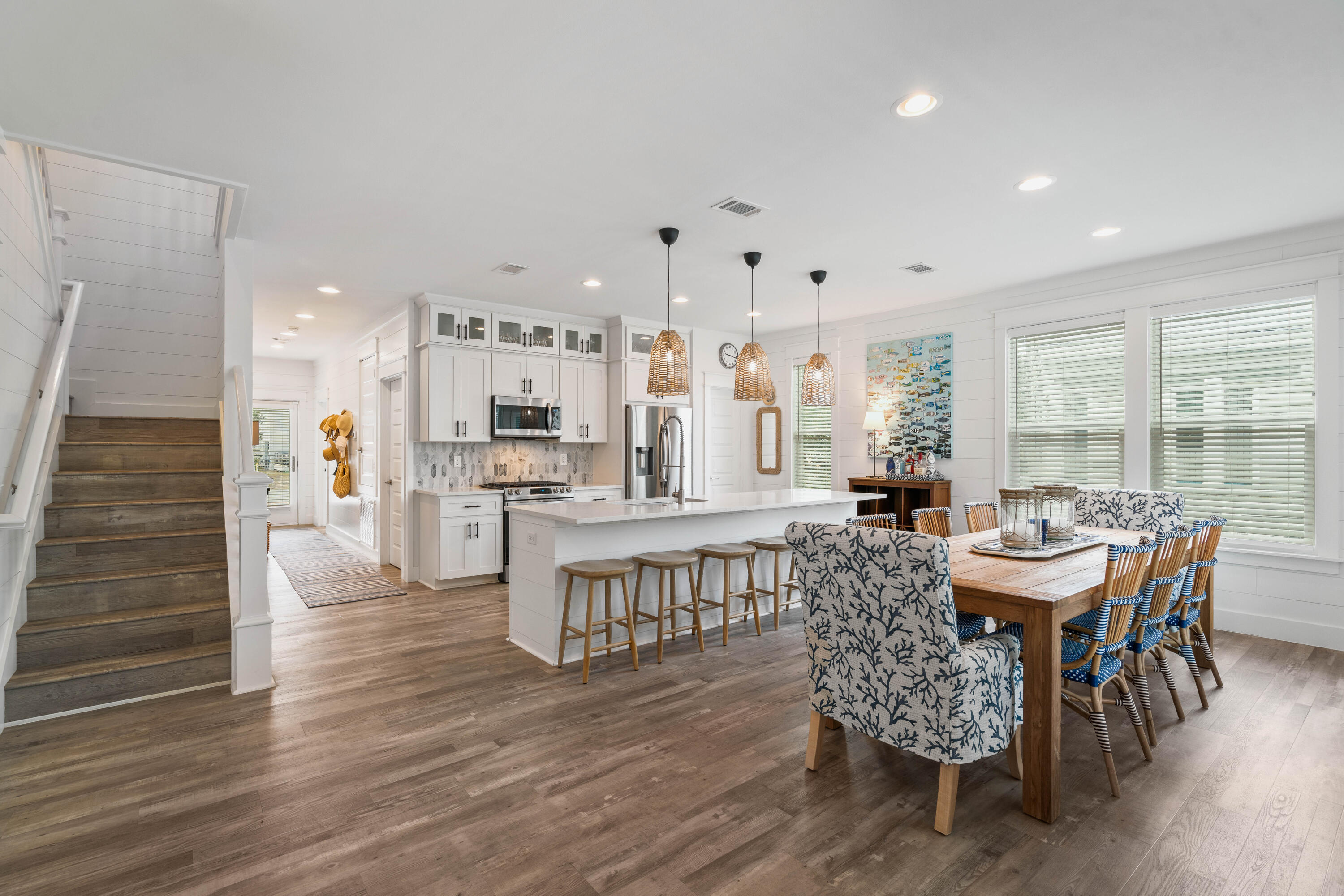 21 Seabreeze Blvd Inlet Beach Inlet Beach, FL 32461 - Photo 11 of 54 a view of a dining room with furniture and wooden floor