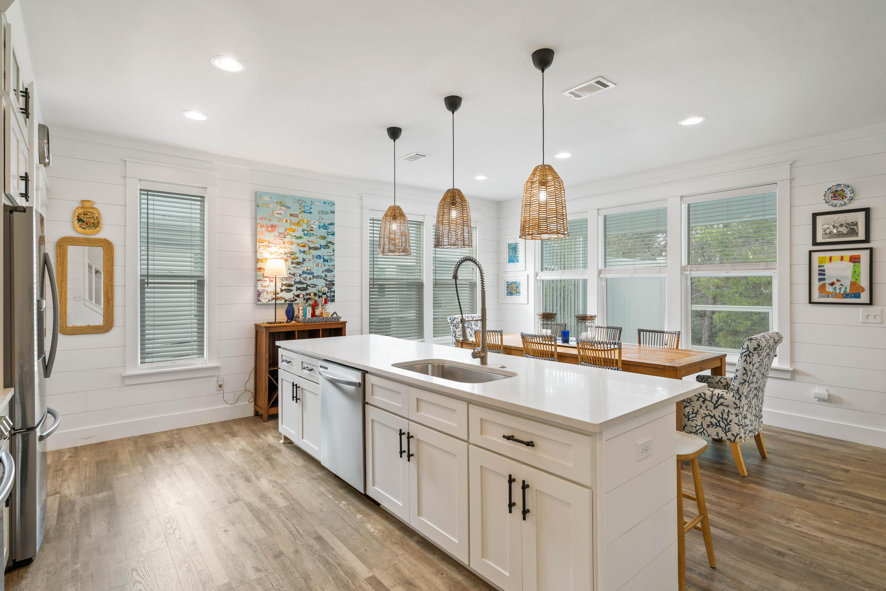 21 Seabreeze Blvd Inlet Beach Inlet Beach, FL 32461 - Photo 15 of 54 a kitchen with sink stove and wooden floor