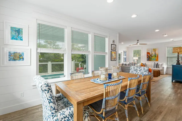 a balcony with furniture and a potted plant