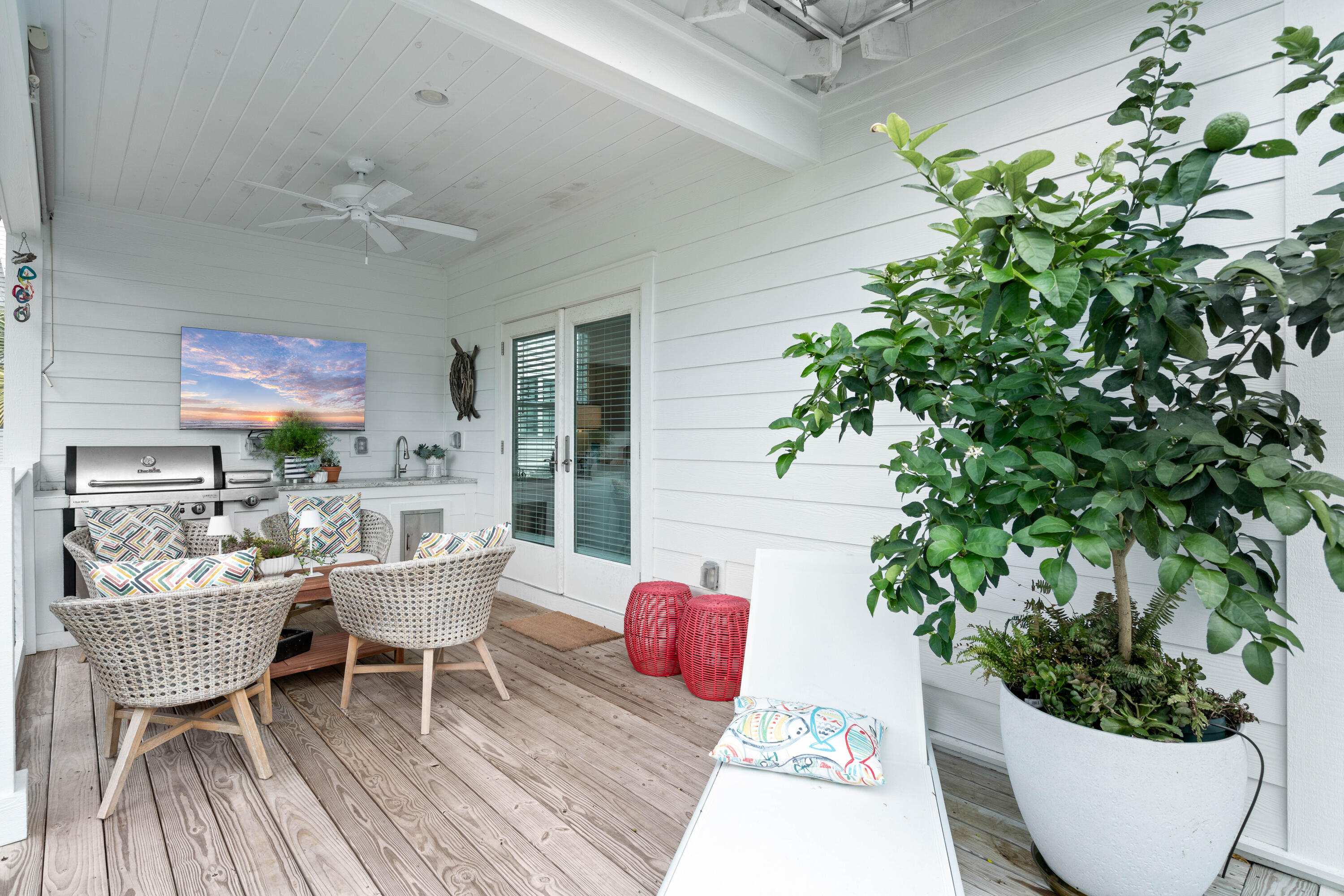 21 Seabreeze Blvd Inlet Beach Inlet Beach, FL 32461 - Photo 18 of 54 a balcony with furniture and a potted plant