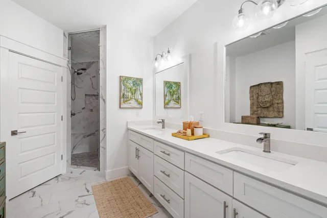 a bedroom with a large bed and a tv