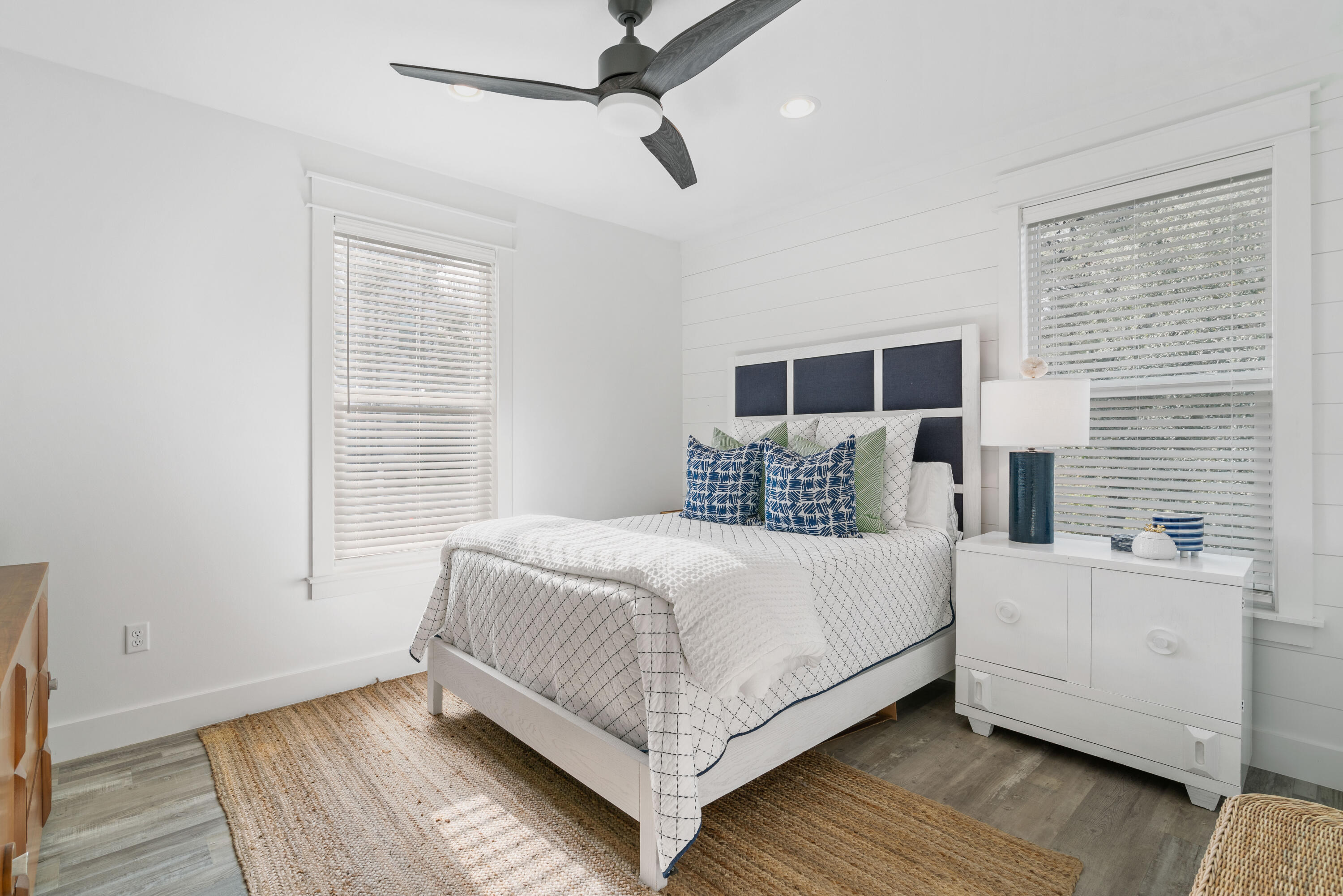 21 Seabreeze Blvd Inlet Beach Inlet Beach, FL 32461 - Photo 26 of 54 a bedroom with a bed and wooden floor