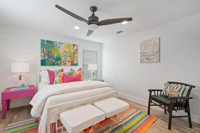 a bathroom with a shower sink and mirror