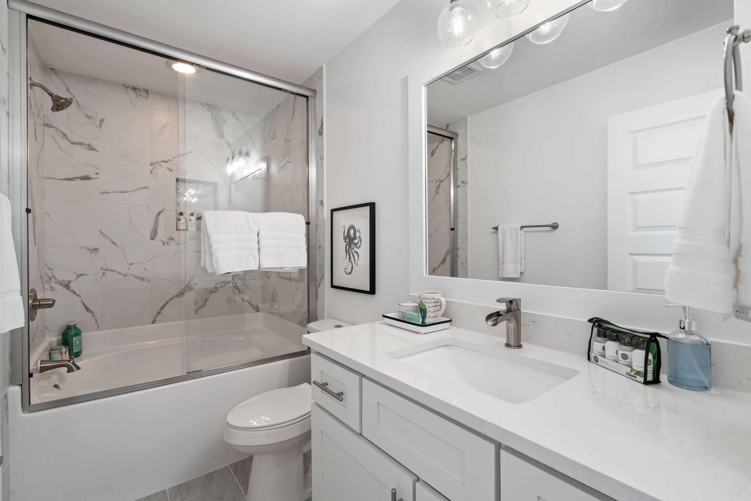 21 Seabreeze Blvd Inlet Beach Inlet Beach, FL 32461 - Photo 35 of 54 a bathroom with a sink vanity mirror and toilet