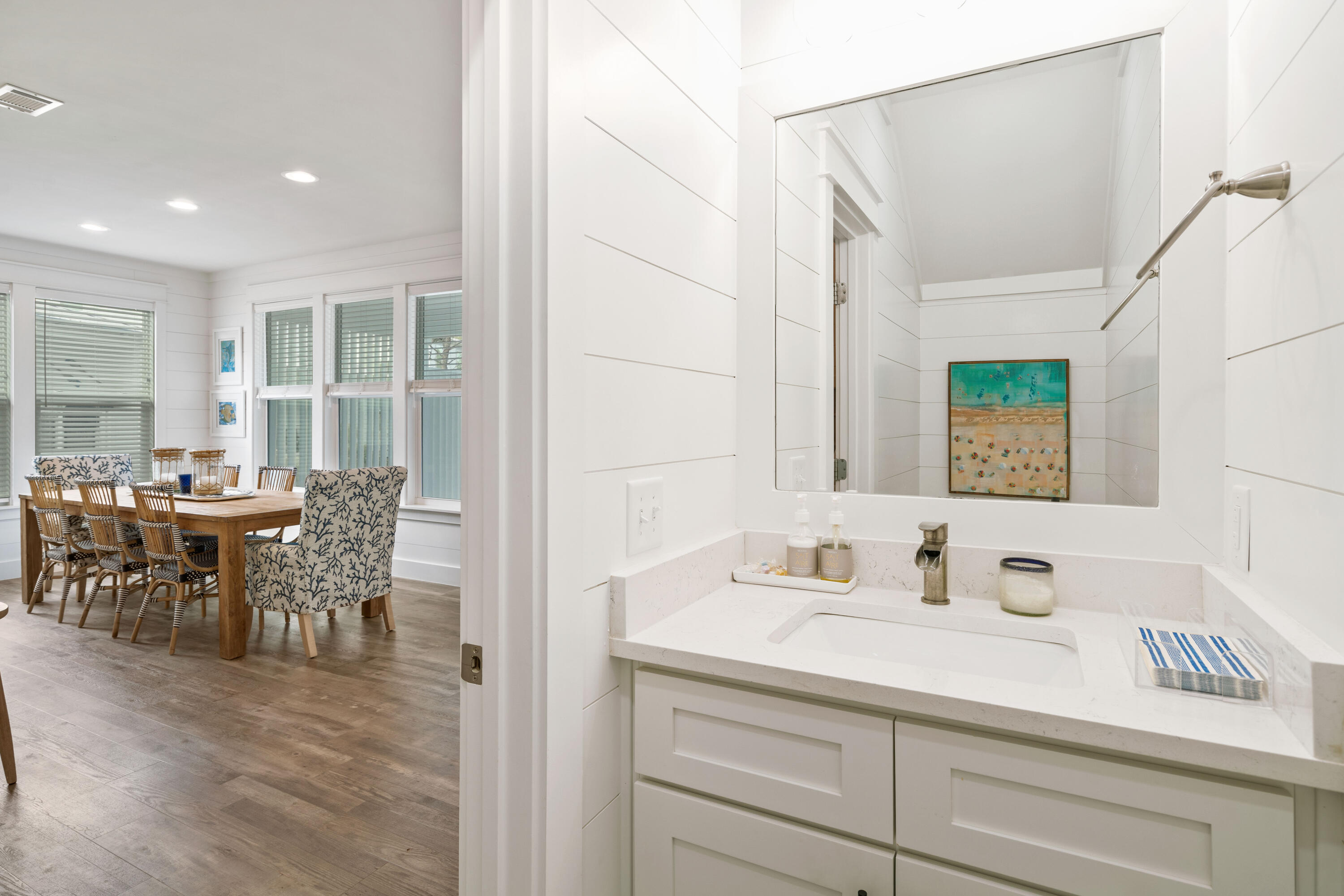 21 Seabreeze Blvd Inlet Beach Inlet Beach, FL 32461 - Photo 38 of 54 a en suite bathroom with sink and mirror