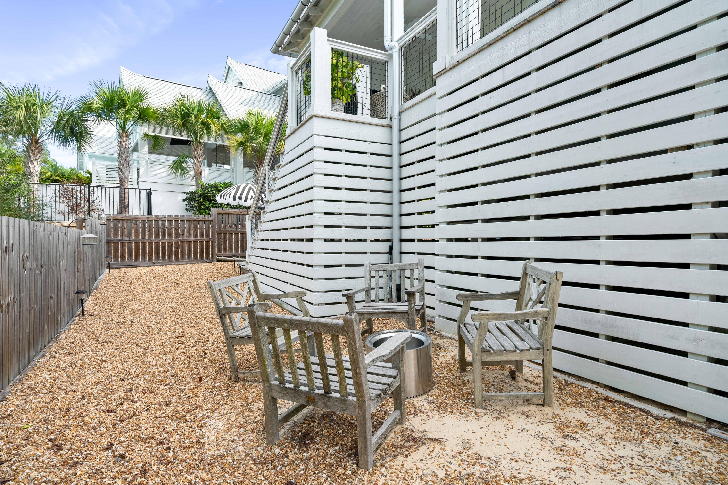 21 Seabreeze Blvd Inlet Beach Inlet Beach, FL 32461 - Photo 42 of 54 a view of a patio with a table and chairs