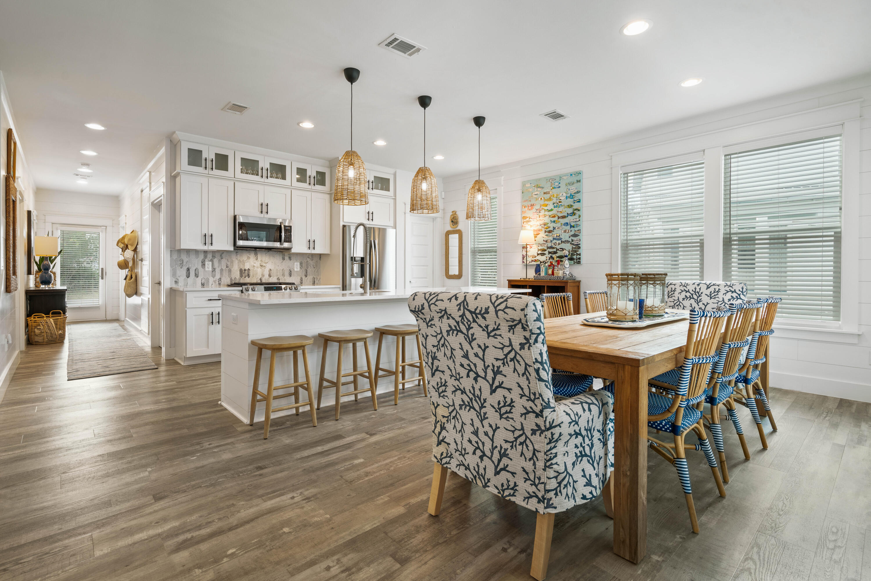 21 Seabreeze Blvd Inlet Beach Inlet Beach, FL 32461 - Photo 5 of 54 a view of a dining room with furniture and wooden floor