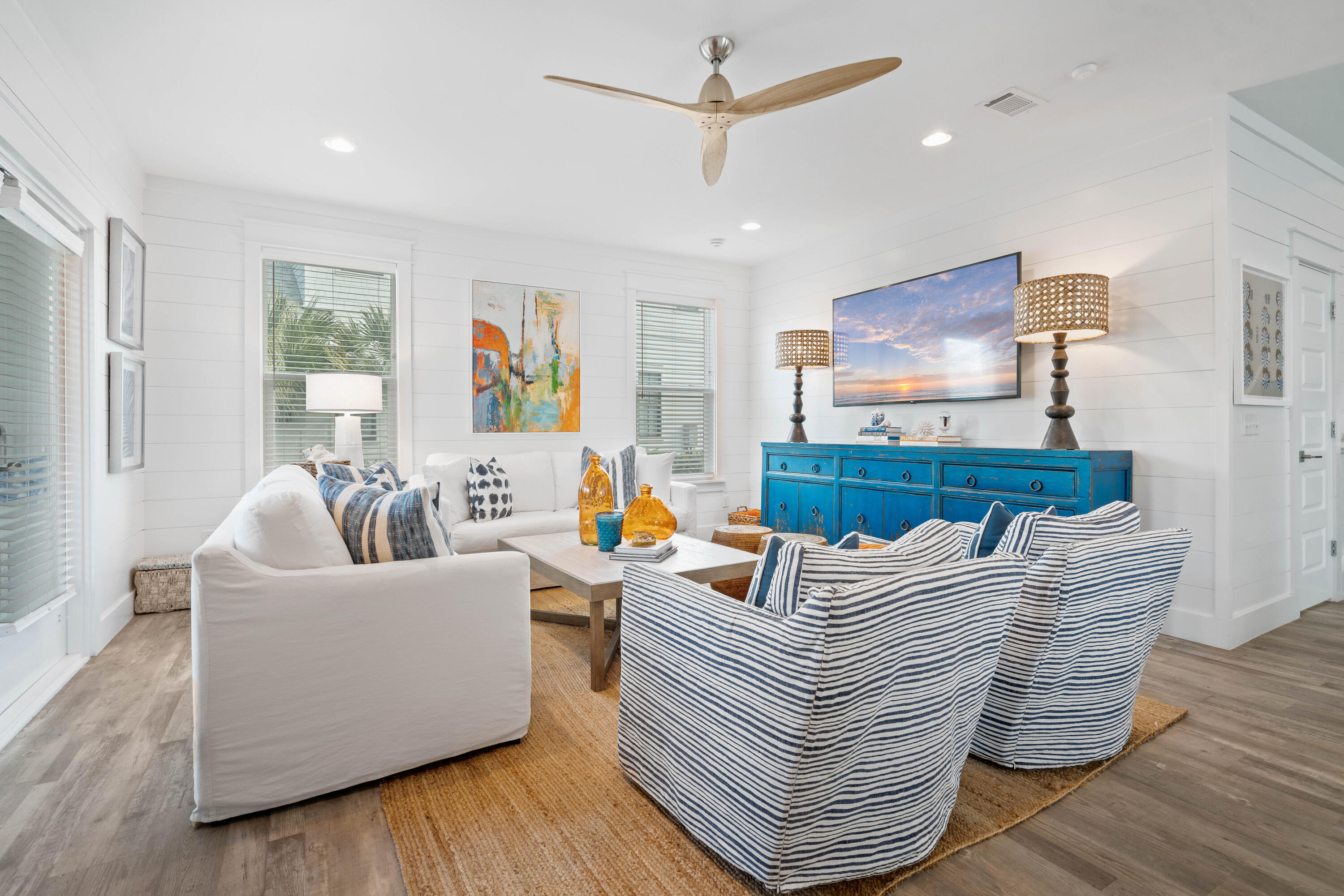 21 Seabreeze Blvd Inlet Beach Inlet Beach, FL 32461 - Photo 8 of 54 a living room with furniture and a flat screen tv