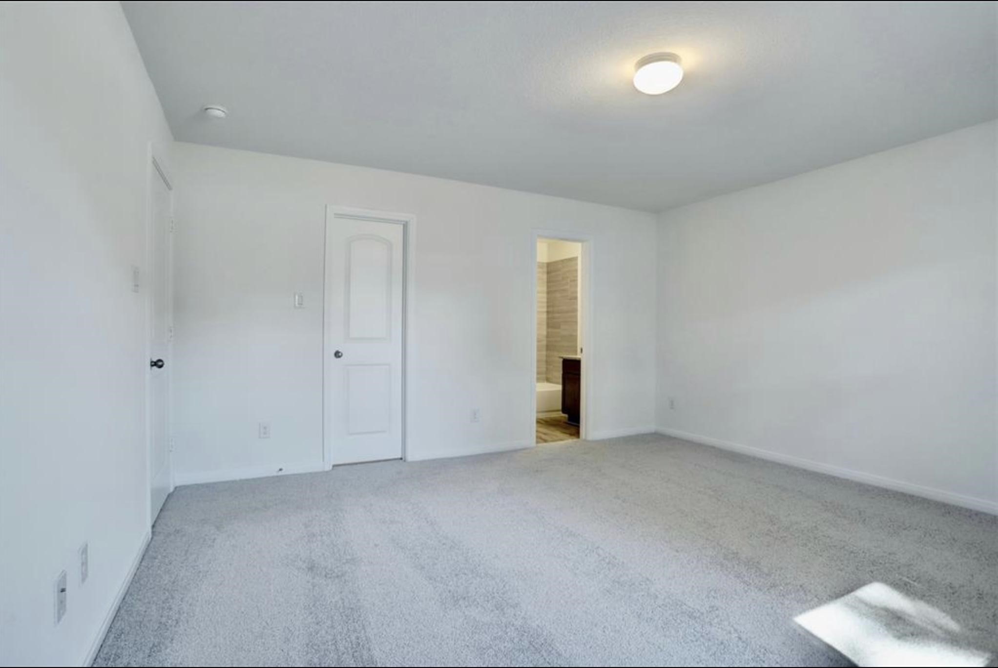 351 Red Clover Livingston, TX 77351 - Photo 14 of 33 an empty room with an entryway