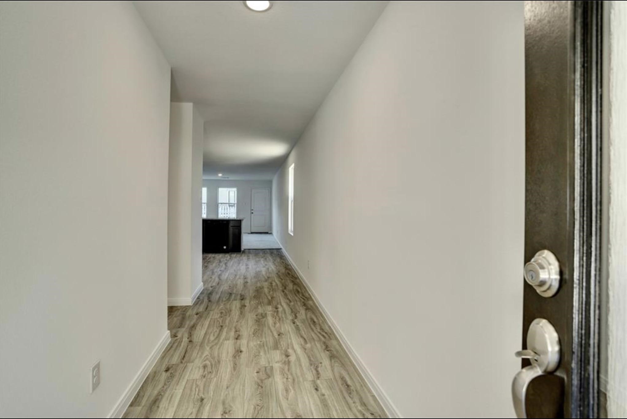 351 Red Clover Livingston, TX 77351 - Photo 3 of 33 a view of a bedroom from a hallway