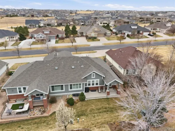 an aerial view of residential building and parking space