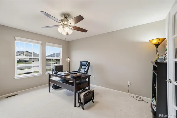 a room with furniture and windows