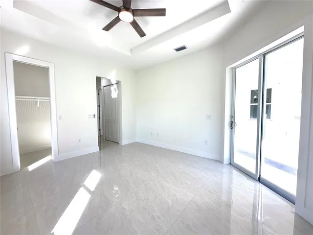 a view of an empty room and window