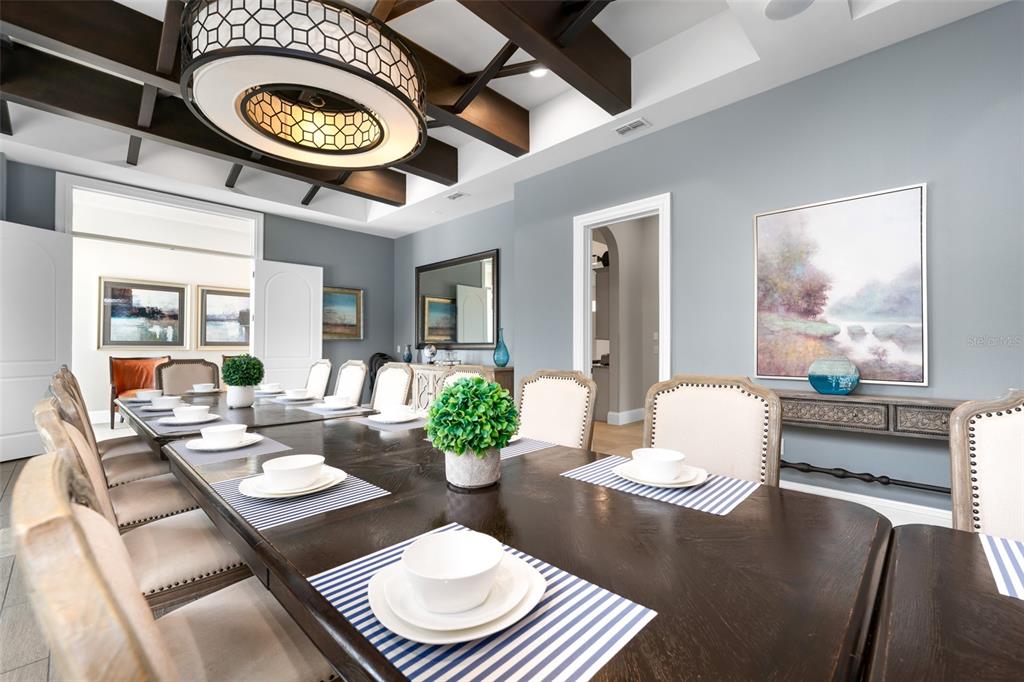 1261 Radiant Street Reunion, FL 34747 - Photo 39 of 100 a living room with furniture and a floor to ceiling window