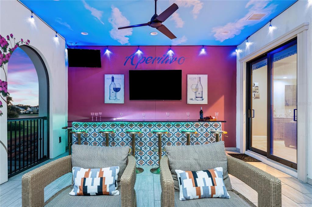 1261 Radiant Street Reunion, FL 34747 - Photo 51 of 100 a room with furniture and a flat screen tv