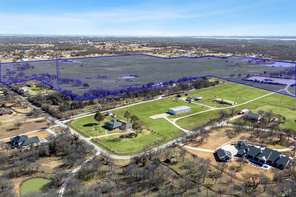 Tbd Cross Timbers Road Flower Mound, TX 75022 - Photo 8 of 30 an aerial view of a tennis ground and a cars park side of the road