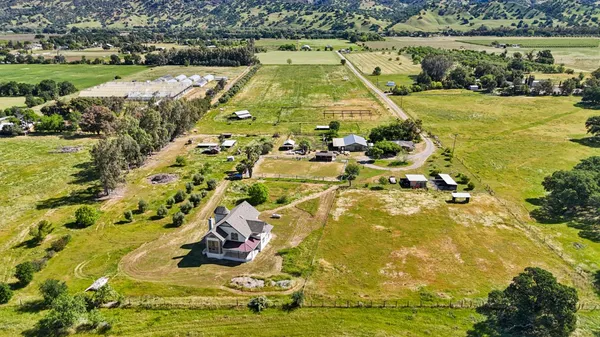a view of a city with mountains in the background