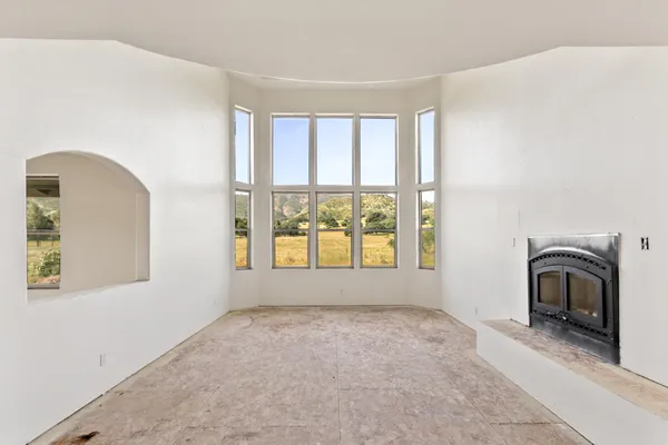 a view of a livingroom with a large window