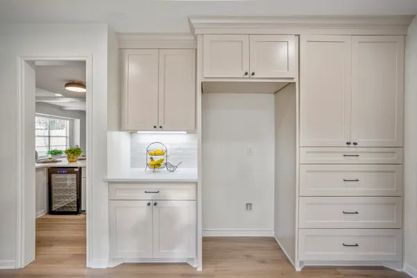 a view of kitchen with wooden floor