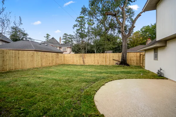 a view of a backyard with a garden