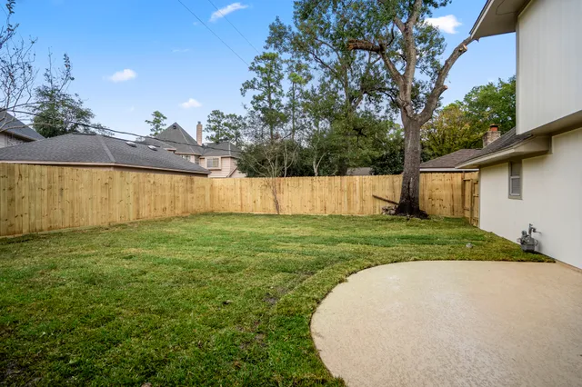 a view of a backyard with a garden