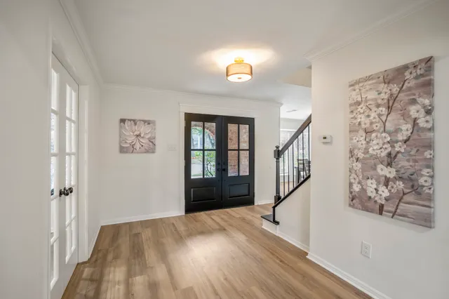 a view of entryway with wooden floor