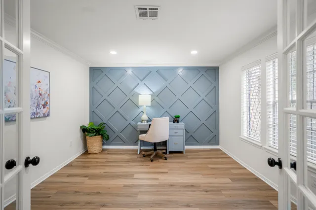 a room with furniture and a window